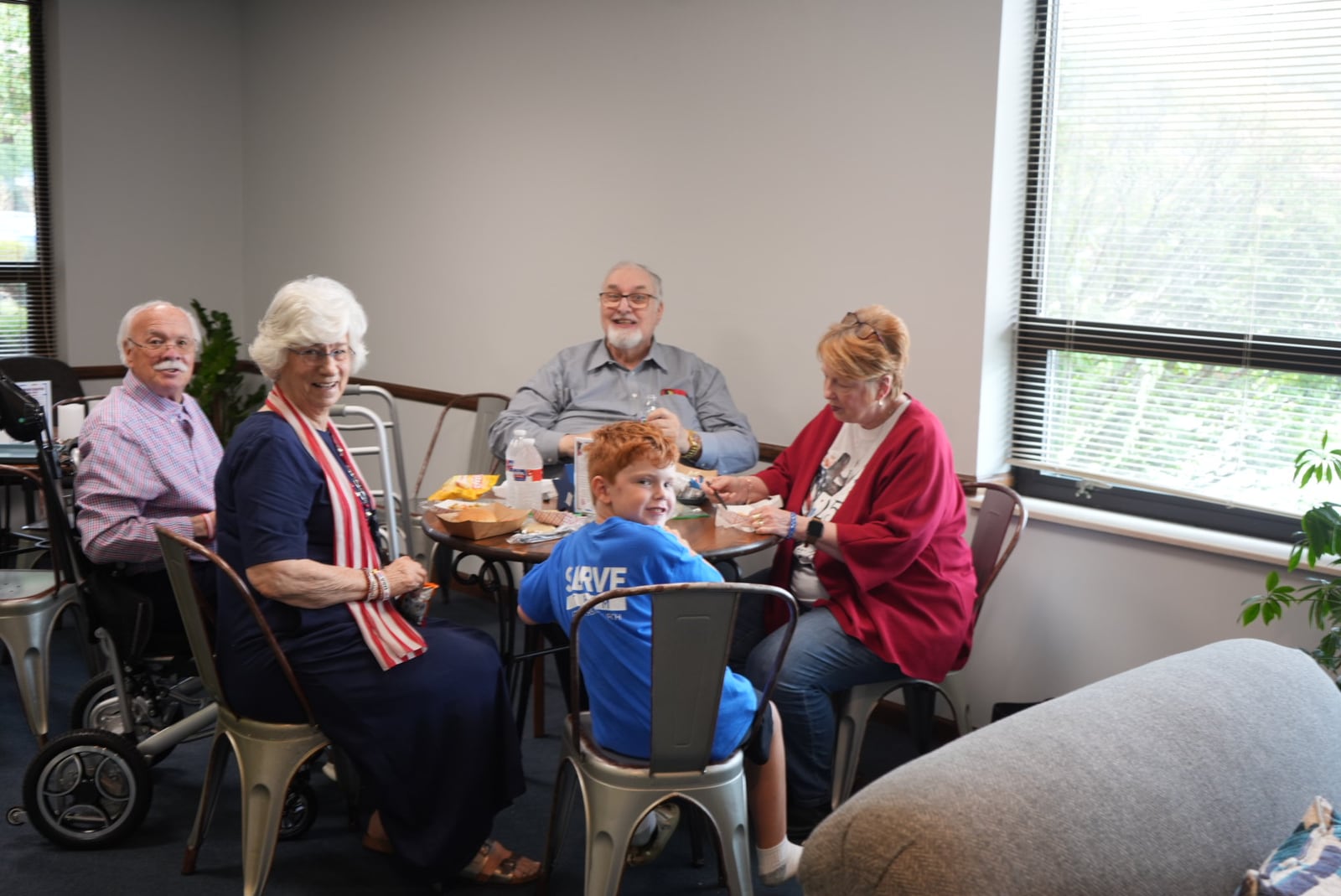 Several generations sharing a meal at GT Church